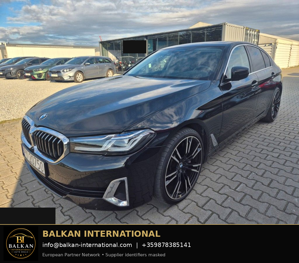 BMW 530d mHEV Luxury Line 2021 — original vehicle photograph 1 with Balkan International contact footer