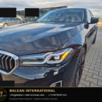BMW 530d mHEV Luxury Line 2021 — original vehicle photograph 2 with Balkan International contact footer