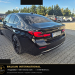 BMW 530d mHEV Luxury Line 2021 — original vehicle photograph 6 with Balkan International contact footer