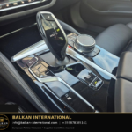 BMW 530d mHEV Luxury Line 2021 — original vehicle photograph 16 with Balkan International contact footer