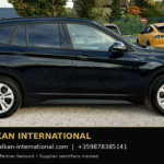 BMW X1 xDrive25e 2021 — original vehicle photograph 4 with Balkan International contact footer
