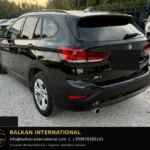 BMW X1 xDrive25e 2021 — original vehicle photograph 5 with Balkan International contact footer