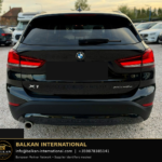 BMW X1 xDrive25e 2021 — original vehicle photograph 7 with Balkan International contact footer