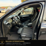 BMW X1 xDrive25e 2021 — original vehicle photograph 9 with Balkan International contact footer