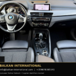 BMW X1 xDrive25e 2021 — original vehicle photograph 11 with Balkan International contact footer