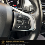 BMW X1 xDrive25e 2021 — original vehicle photograph 21 with Balkan International contact footer