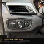 BMW X1 xDrive25e 2021 — original vehicle photograph 31 with Balkan International contact footer