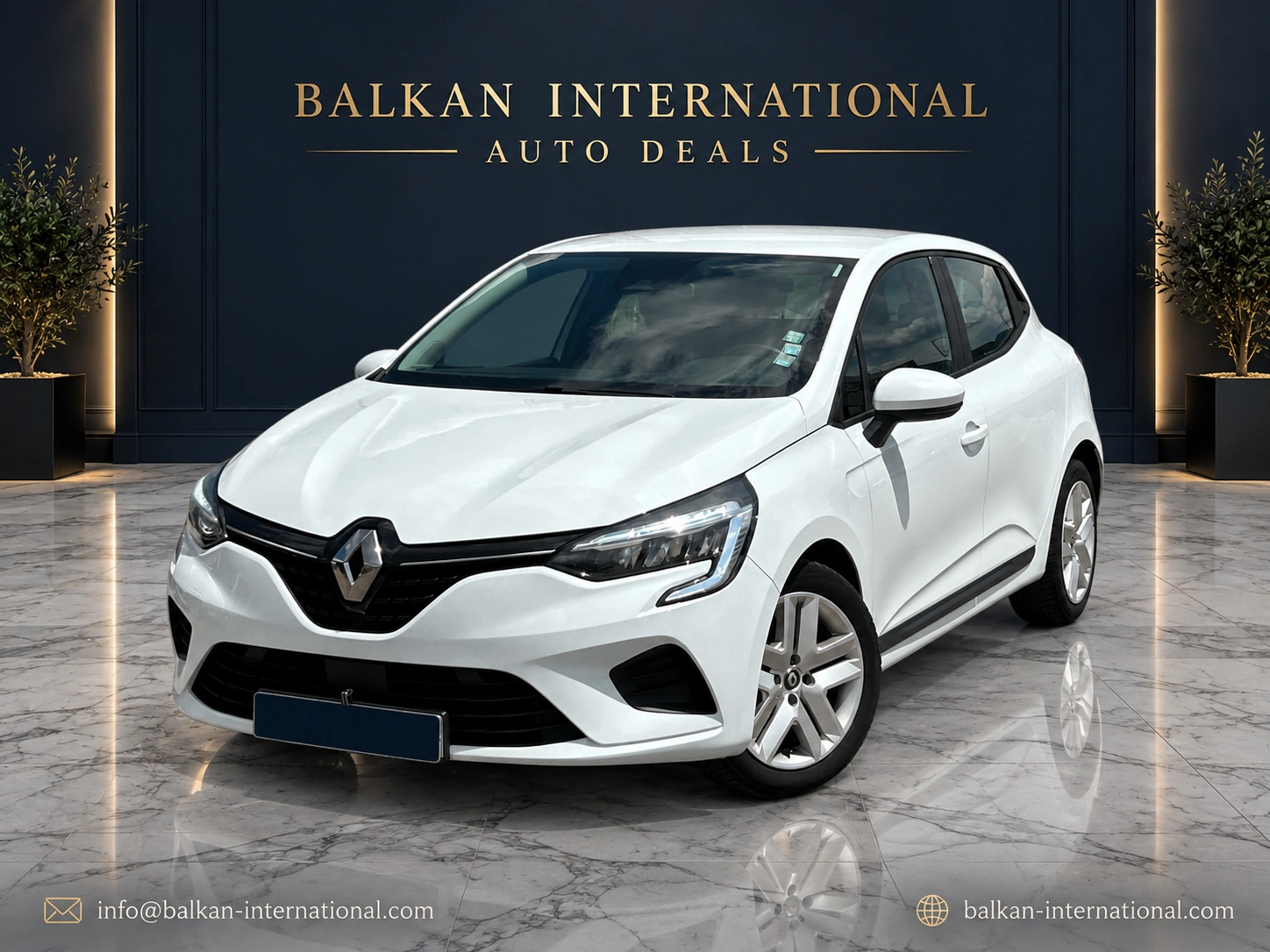 Renault Clio — digitally edited Balkan showroom and marble floor; illustrative backdrop