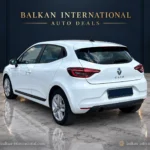 Renault Clio exterior view 2 — digitally edited Balkan International showroom backdrop and marble floor