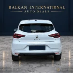Renault Clio exterior view 4 — digitally edited Balkan International showroom backdrop and marble floor