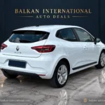 Renault Clio exterior view 7 — digitally edited Balkan International showroom backdrop and marble floor