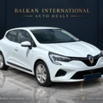 Renault Clio exterior view 8 — digitally edited Balkan International showroom backdrop and marble floor
